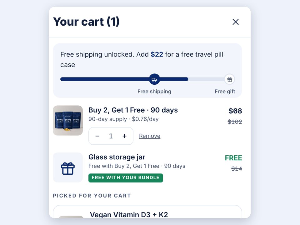 The slide-out cart with a free-shipping progress bar, a free gift and two add-on products