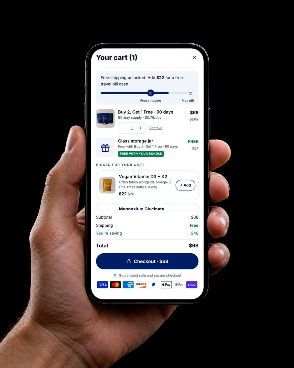 A phone showing the kit's slide-out cart with a free-shipping progress bar and a free gift